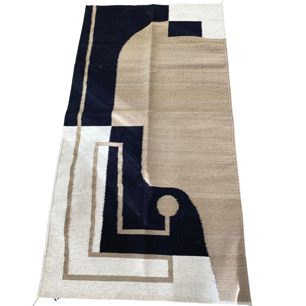 Woven Rug + Tan Line